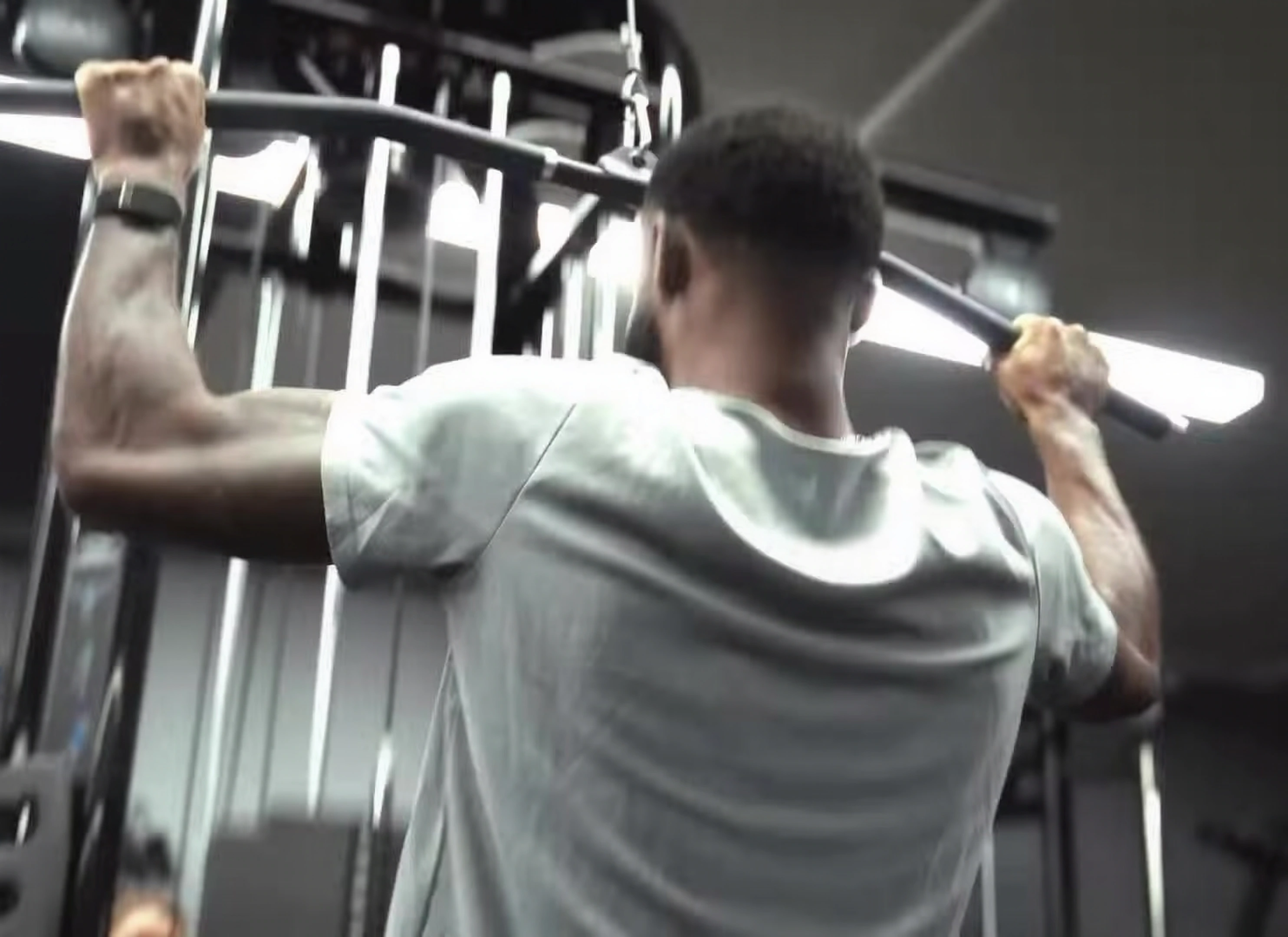 Sam Graham training on a lat pulldown machine